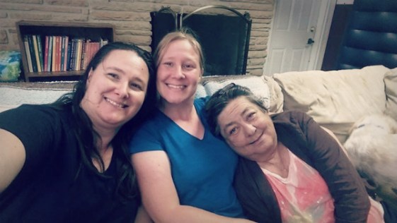 Mama, my sister, and I two months before